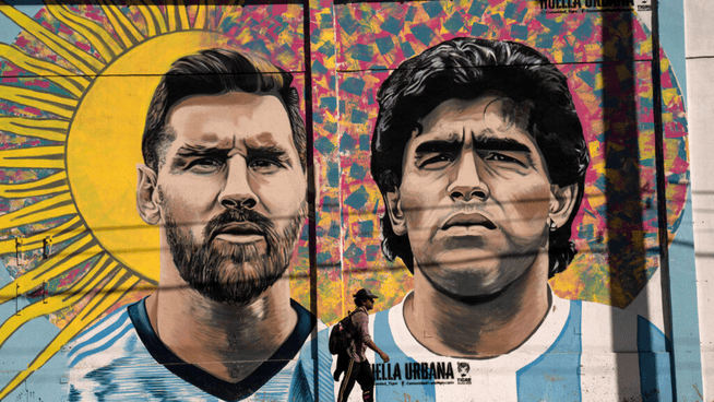large mural of lionel messi and diego maradona